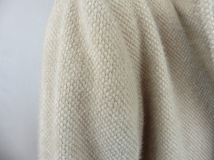 Abrigo beige de Lourdes Castillo