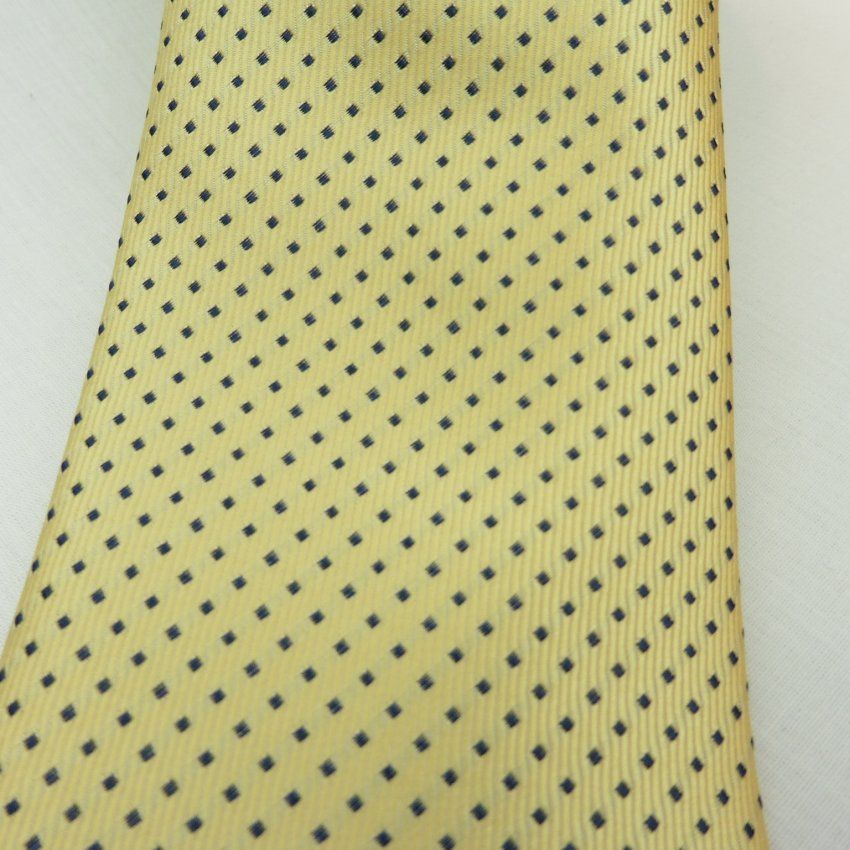 Corbata amarilla con mini rombos marino de Boccola