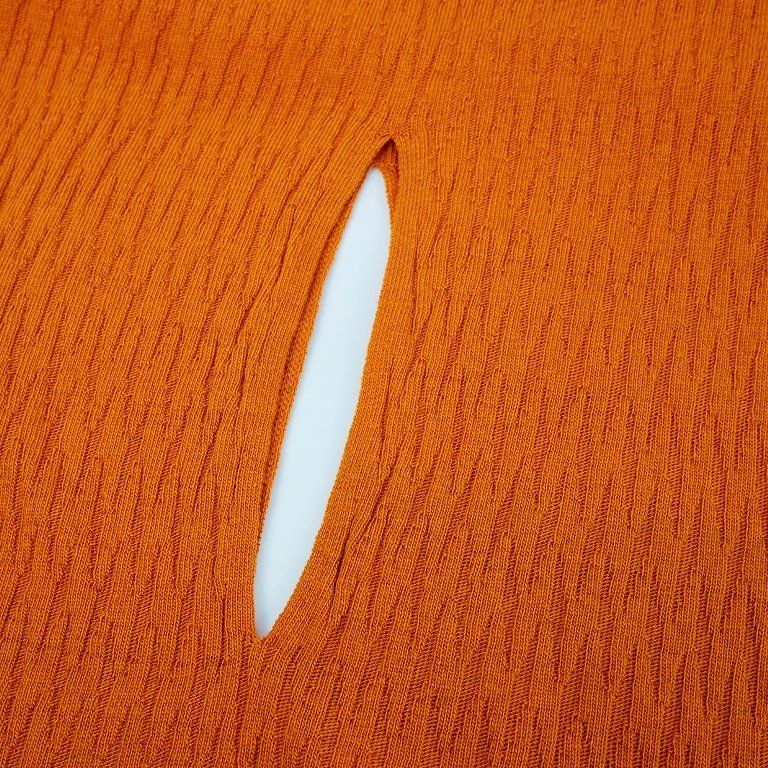 Poncho naranja de Surkana