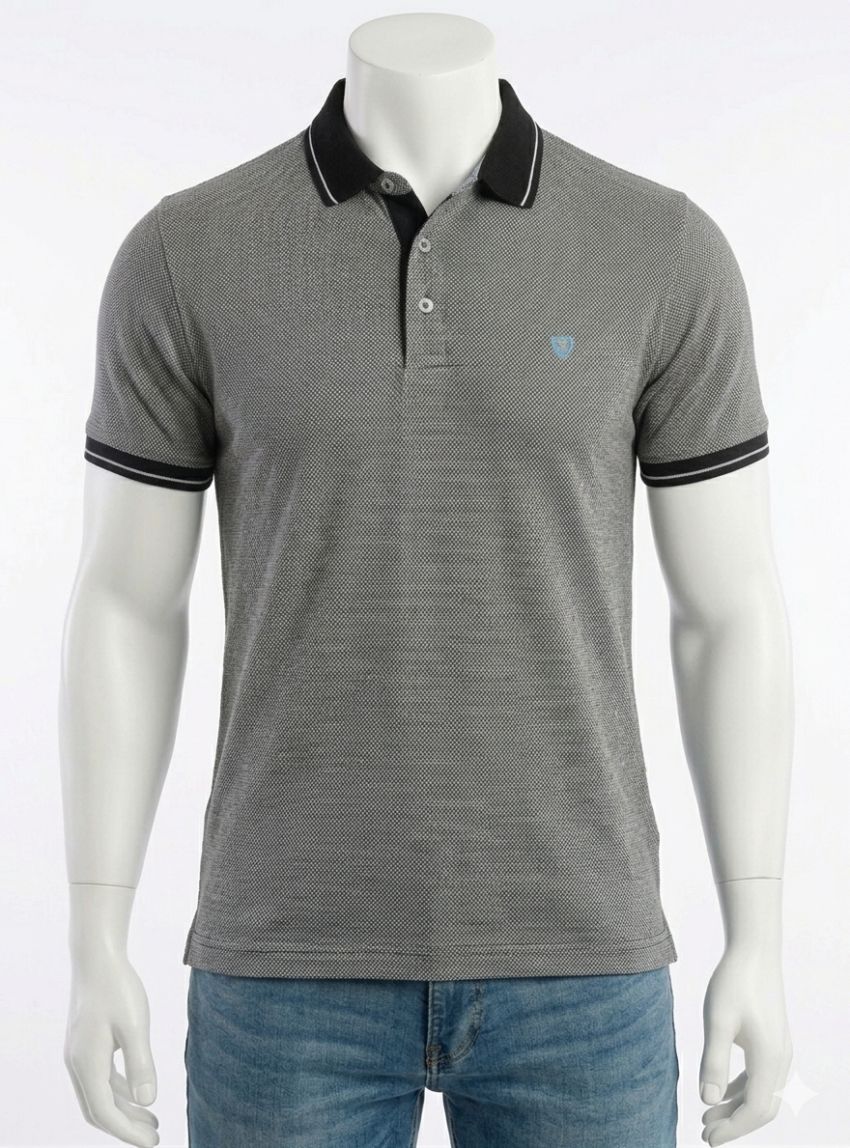 Polo puntos azul marino y blancos de Tomé