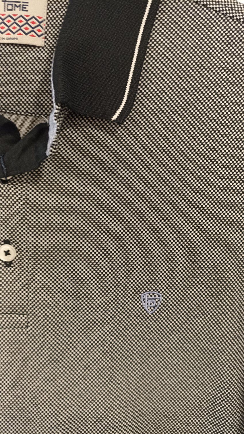 Polo puntos azul marino y blancos de Tomé