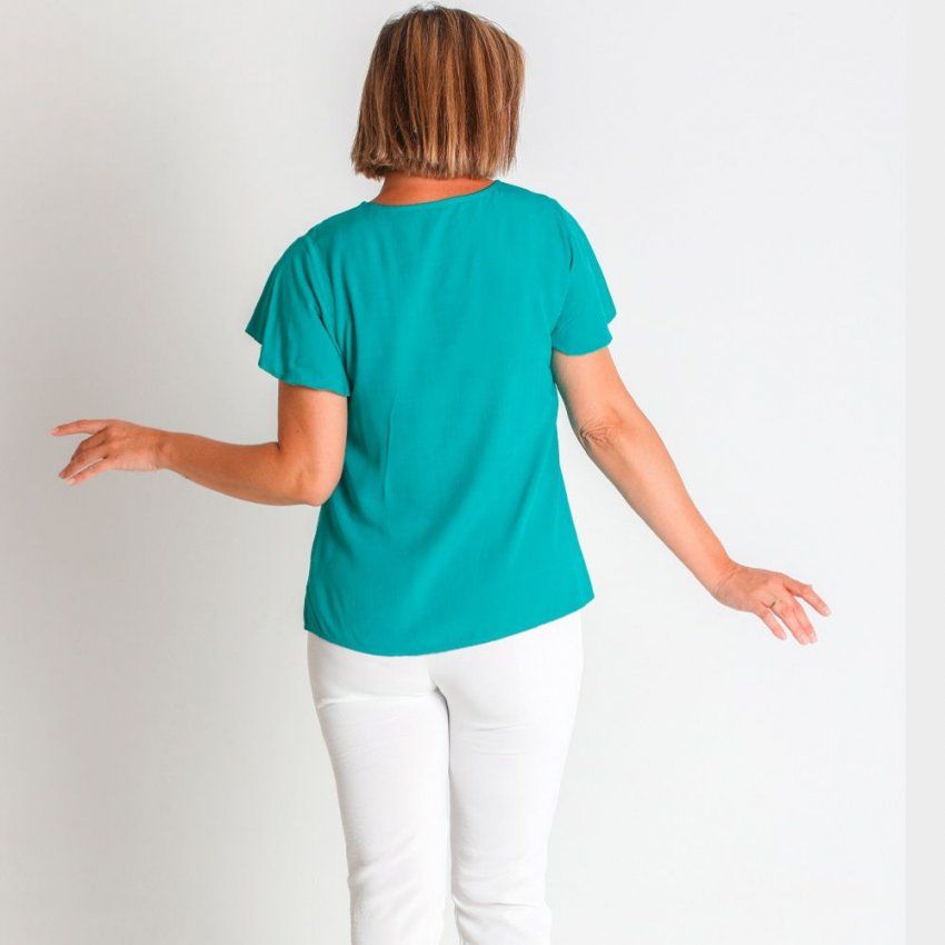 Blusa verde esmeralda de Lourdes Castillo