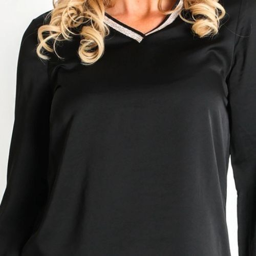 Blusa negra vivo dorado de Lourdes Castillo