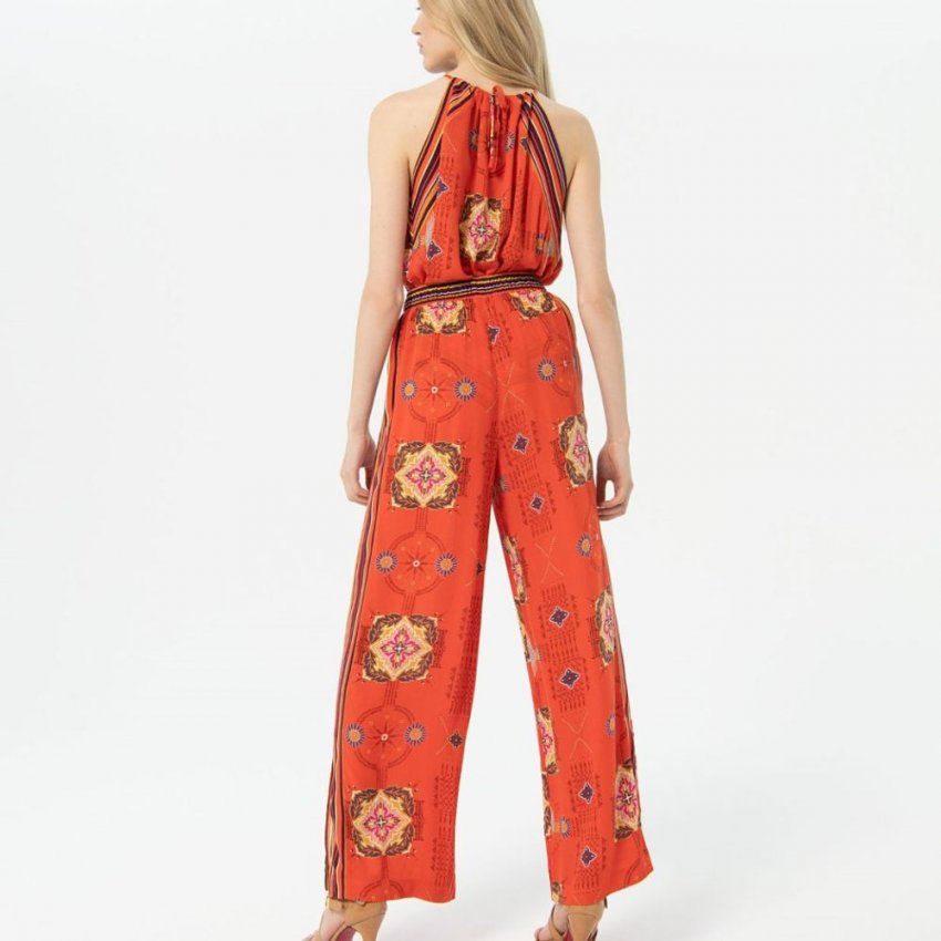 Pantalón naranja con estampado rayas de Surkana