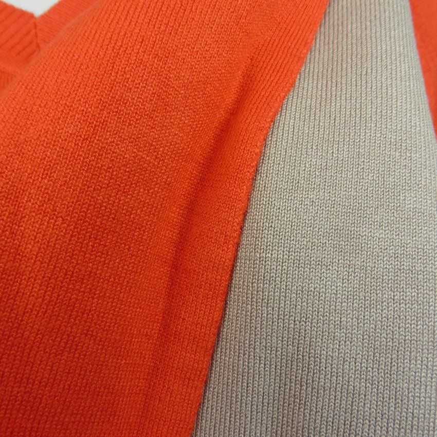 Bufanda de punto naranja y beige de WNT Collection