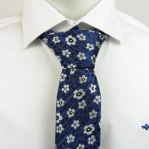 Corbata azul marino con flores blancas y raya blanca difuminada de Boccola